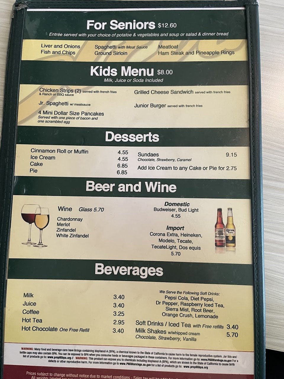 Printed menu with breakfast and lunch items.